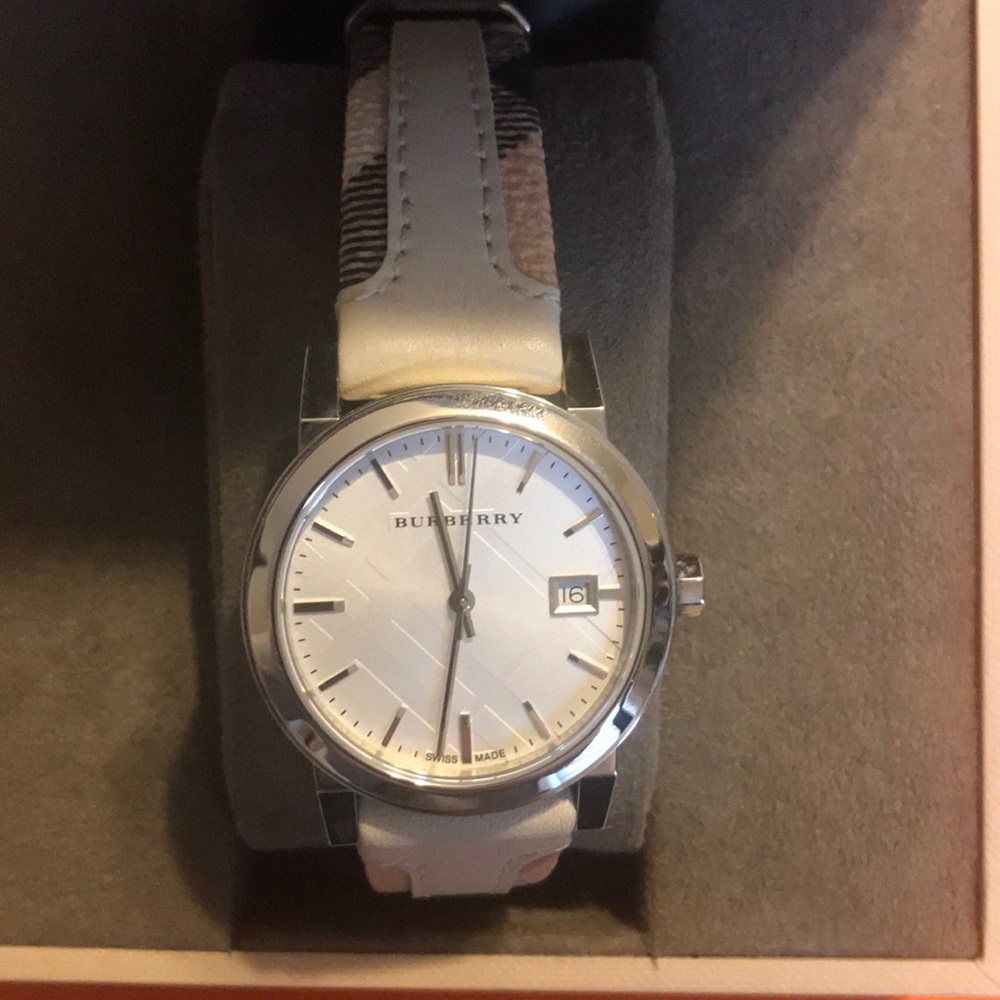 Grey and traditional Burberry pattern silver watch